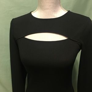 H&M dress. Black. Detail on neck. Size 6. Ribbing